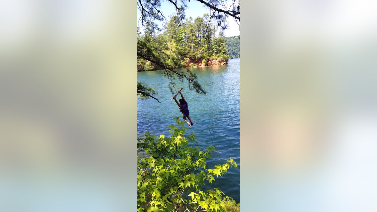 Rope swinging into a lake in South Carolina