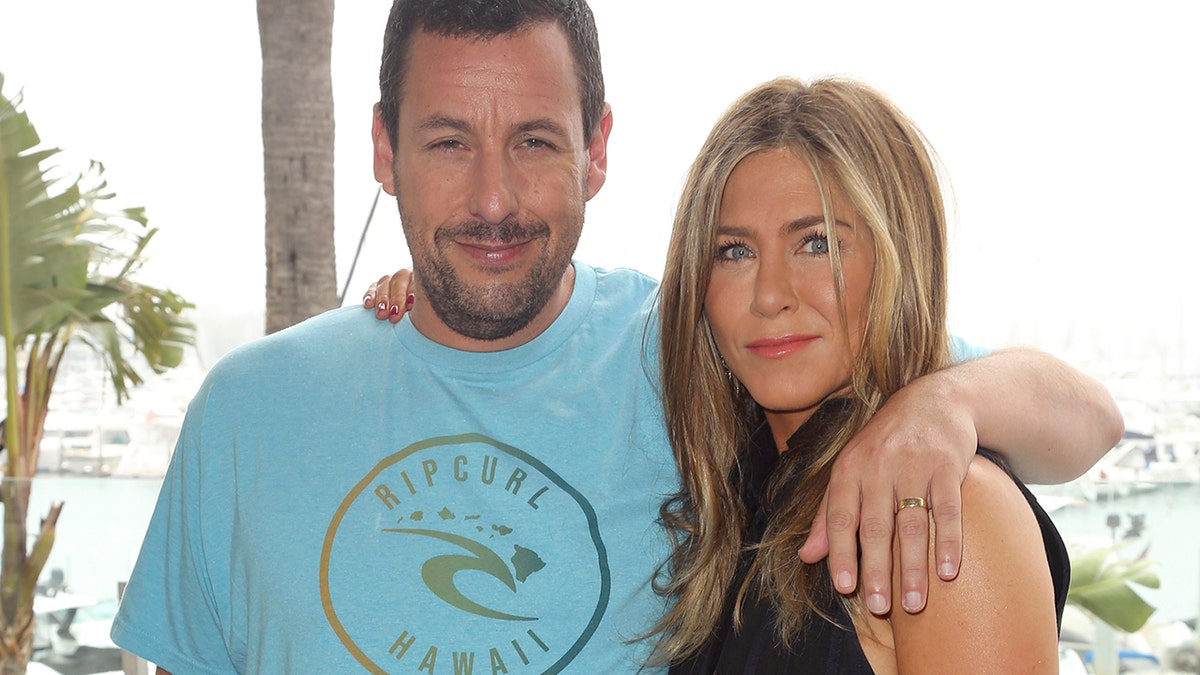 Adam Sandler, left, and Jennifer Aniston attend the "Murder Mystery" photo call at the Ritz-Carlton Marina del Rey on Tuesday, June 11, 2019, in Los Angeles. (Photo by Willy Sanjuan/Invision/AP)