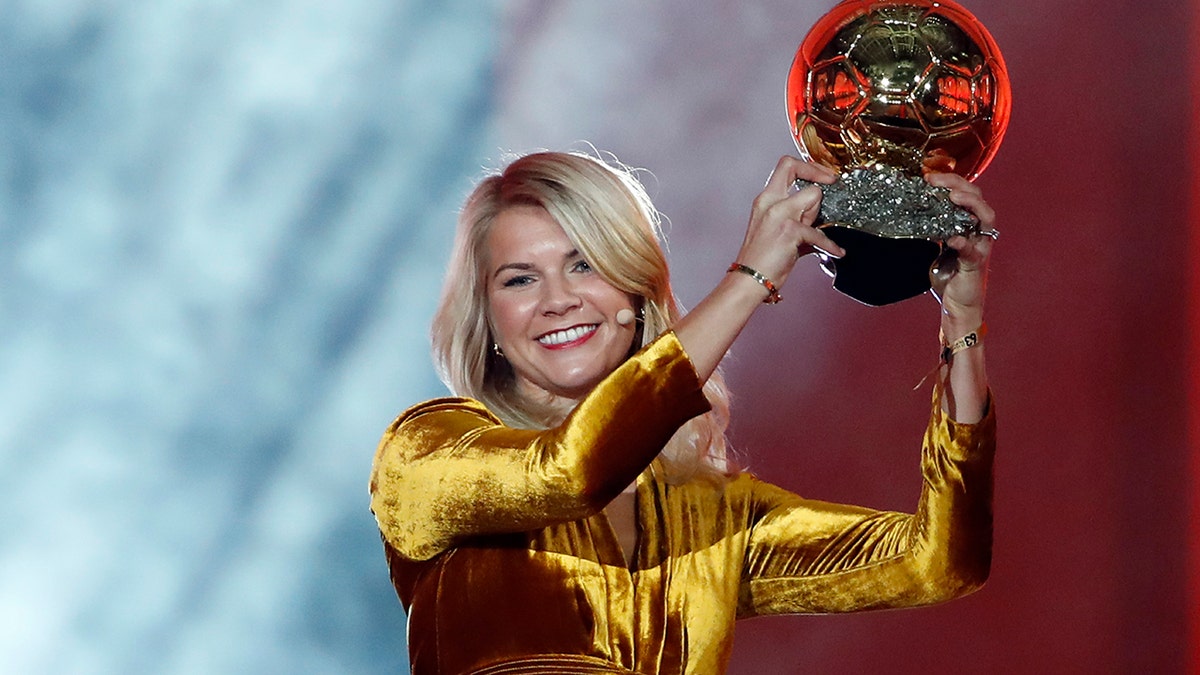 ?Ada Hegerberg celebrates with the Women's Ballon d'Or award during the Golden Ball award ceremony at the Grand Palais in Paris, France in 2018. (AP Photo/Christophe Ena, File)