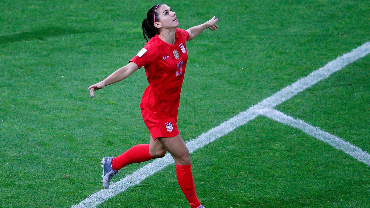 United States' Alex Morgan celebrates after scoring her third goal during the Women's World Cup Group F soccer match between the United States and Thailand at the Stade Auguste-Delaune in Reims, France, Tuesday, June 11, 2019. (AP Photo/Francois Mori)