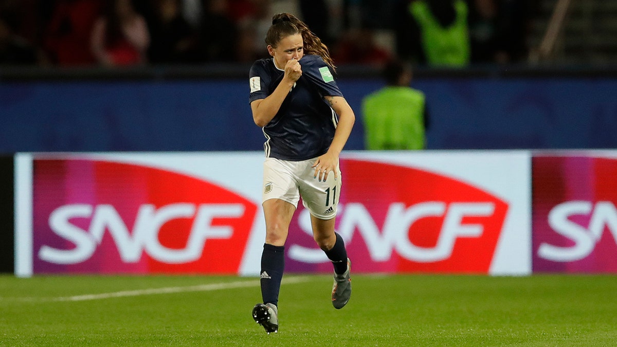 Argentina's Florencia Bonsegundo celebrates after scoring an equaliser goal during the Women's World Cup Group D soccer match between Scotland and Argentina at Parc des Princes in Paris, France, Wednesday, June 19, 2019. Bonsegundo scored in the extra time and the match ended in a 3-3 draw. (AP Photo/Alessandra Tarantino)