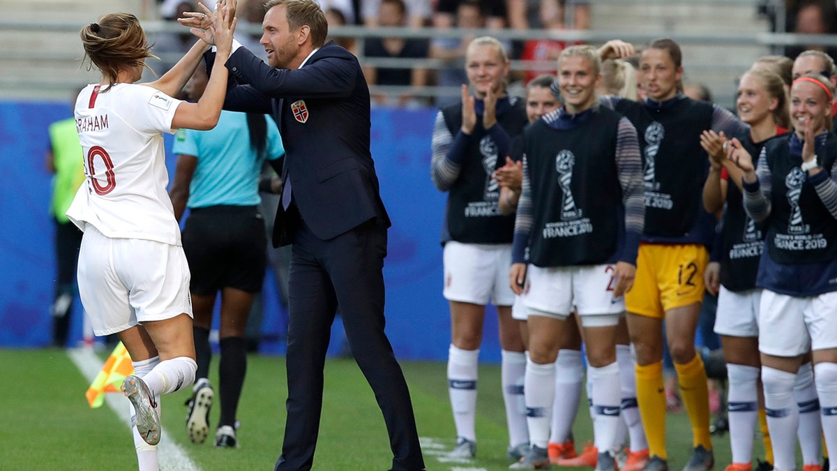 Norway's Caroline Graham Hansen, left, is congratulated by Norway coach Martin Sjogren after scoring her team's first goal during the Women's World Cup Group A soccer match between Norway and South Korea at the Stade Auguste-Delaune in Reims, France, Monday, June 17, 2019. (AP Photo/Alessandra Tarantino)