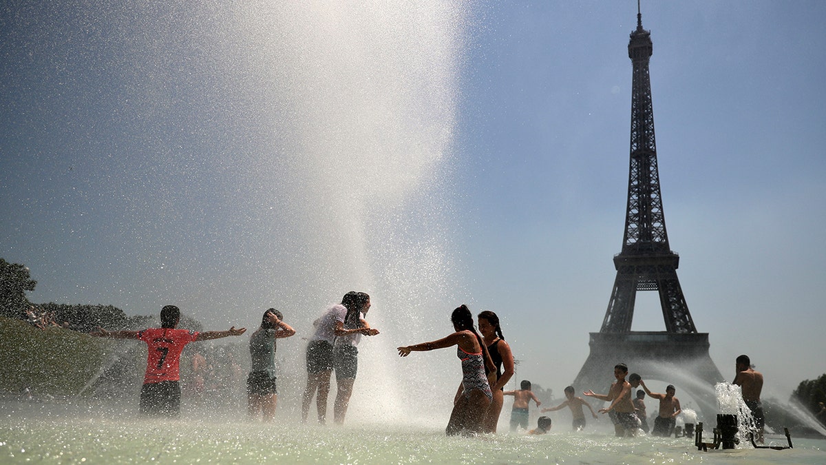 High temperatures are expected to go up to 102 Fahrenheit in the Paris area this week and bake much of the country, from the Pyrenees in the southwest to the German border in the northeast. (AP Photo/Francisco Seco)