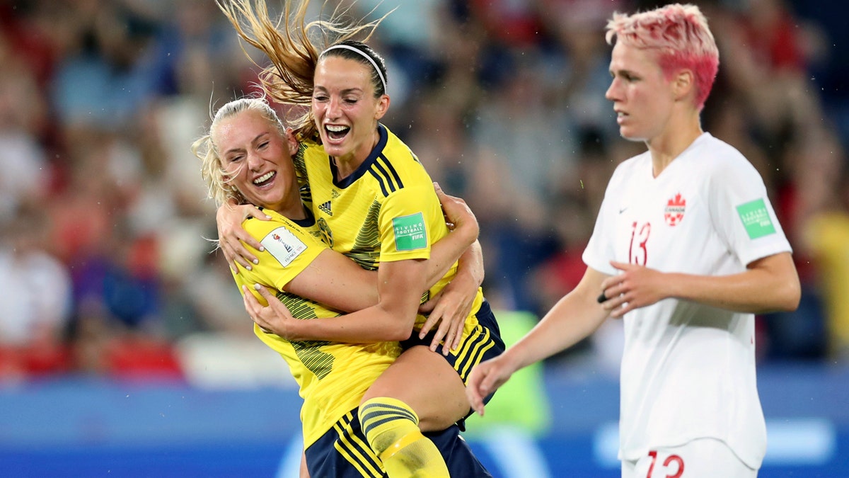 Sweden's Stina Blackstenius, left, celebrates scoring the only goal of Monday's match. (AP Photo/Francisco Seco)