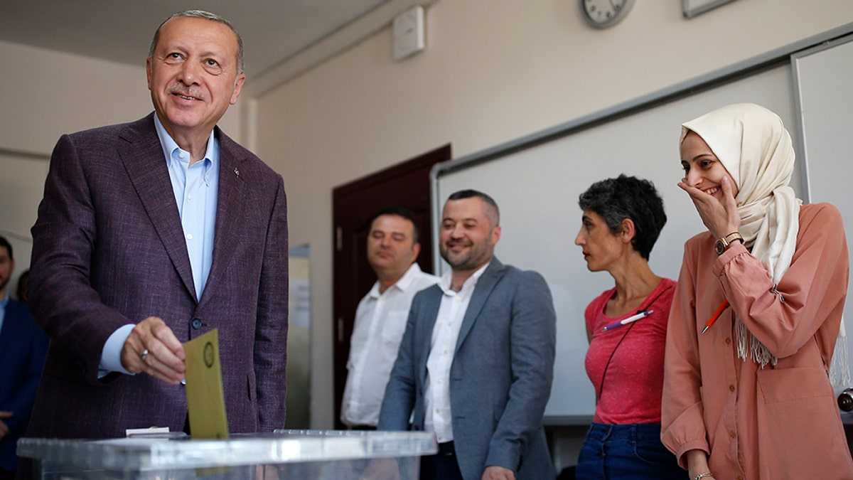 Turkey's President Recep Tayyip Erdogan casting his ballot Sunday. (AP Photo/Emrah Gurel)
