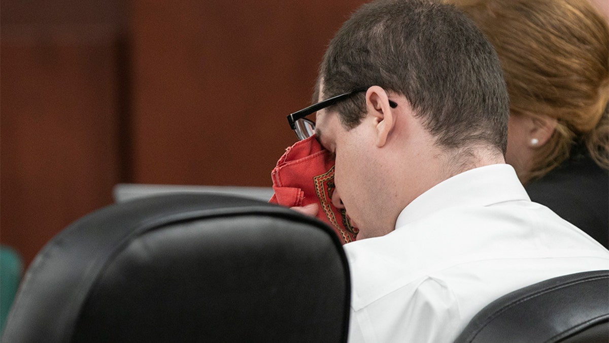 Timothy Jones Jr. wiping his eyes as his ex-wife, Amber Kyzer, testified Tuesday. (Tracy Glantz/The State via AP, Pool)