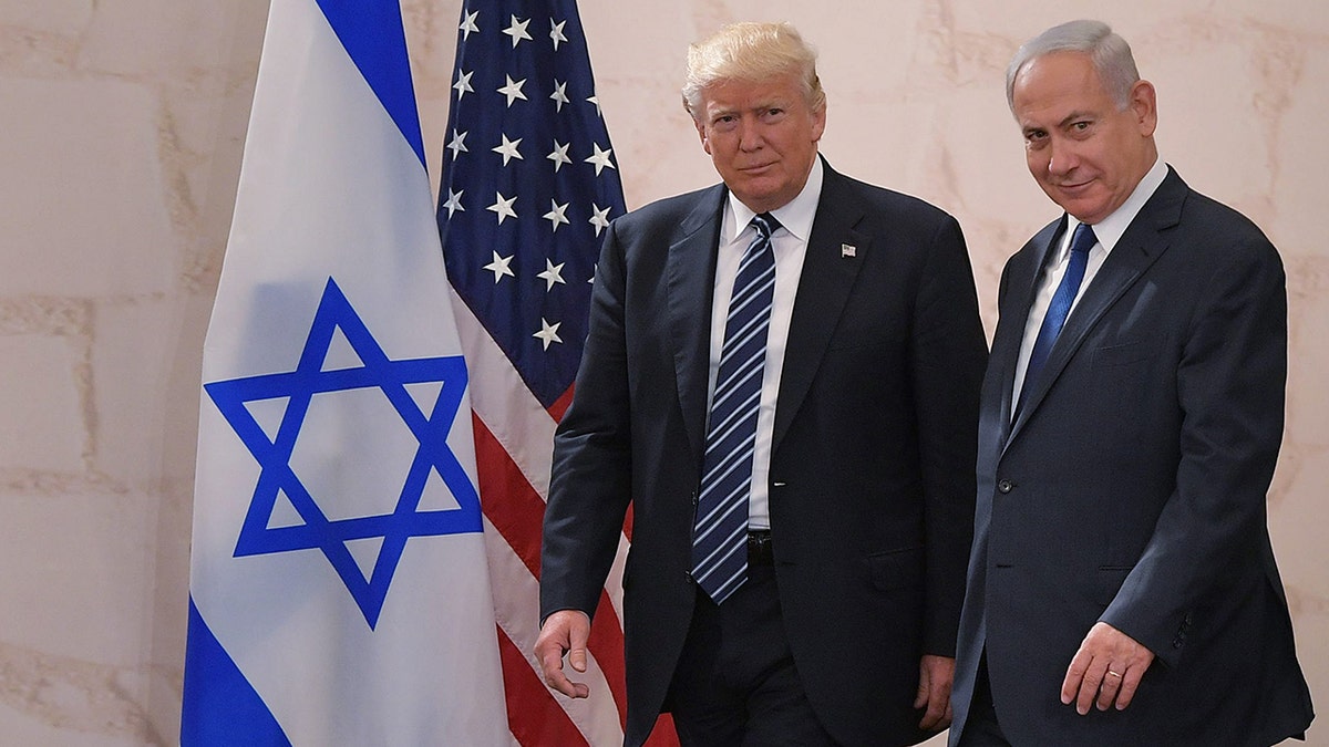 U.S. President Trump (L) arrives at the Israel Museum to speak in Jerusalem on May 23, 2017, accompanied by Israeli Prime Minister Benjamin Netanyahu.