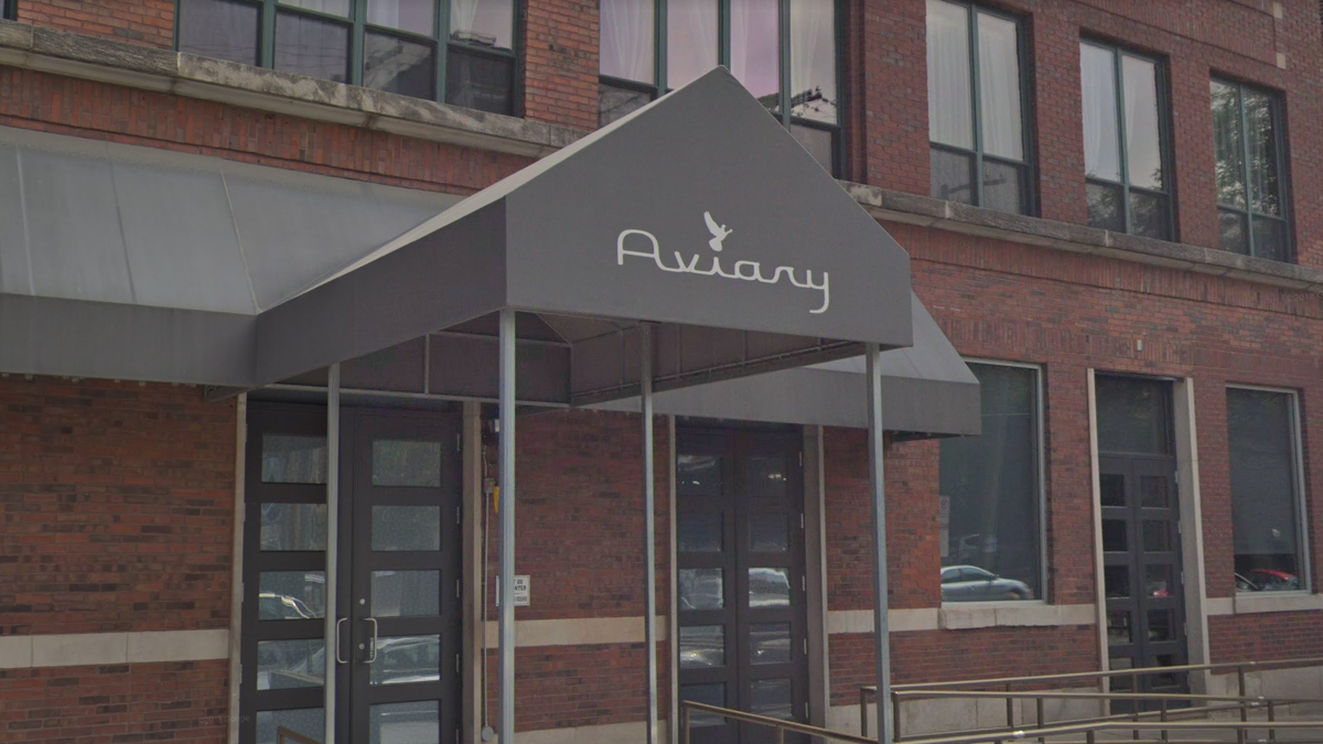 The restaurant group that owns Aviary has confirmed the employee was placed on leave following the incident.