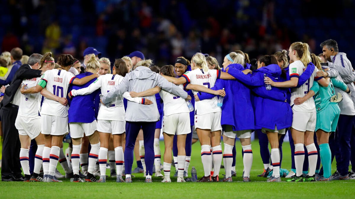 US players embrace following their 2-0 win over Sweden in their Women's World Cup Group F soccer match at Stade Océane, in Le Havre, France, Thursday, June 20, 2019. (AP Photo/Alessandra Tarantino)