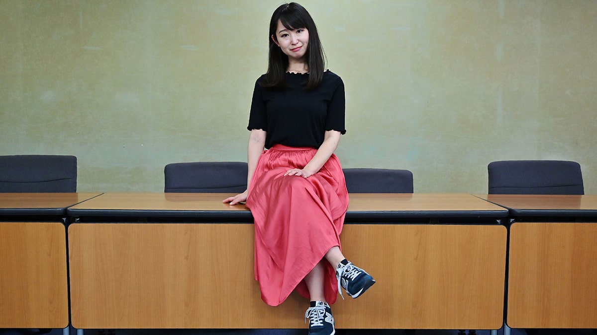 Yumi Ishikawa, leader and founder of the KuToo movement, poses after a press conference in Tokyo on June 3, 2019. (Photo by Charly TRIBALLEAU / AFP)
