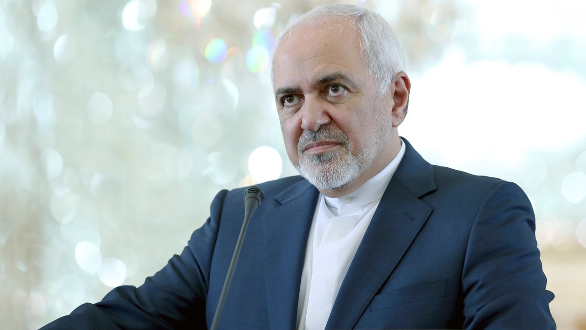 Iranian Foreign Minister Mohammad Javad Zarif speaks during a press conference with his German counterpart Heiko Maas after their talks in Tehran, Iran, Monday, June 10, 2019. Zarif warned the U.S. on Monday that it "cannot expect to stay safe" after launching what he described as an economic war against Tehran, taking a hard-line stance amid a visit by Germany's top diplomat seeking to defuse tensions.