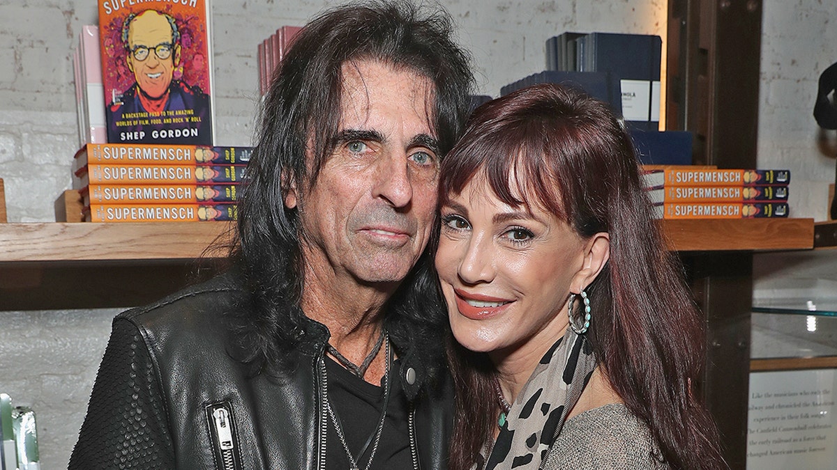NEW YORK, NY - SEPTEMBER 27: Alice Cooper (L) and wife Sheryl Goddard attend as Alice Cooper, Shep Gordon and Shinola celebrate the release of Gordons Memoir,