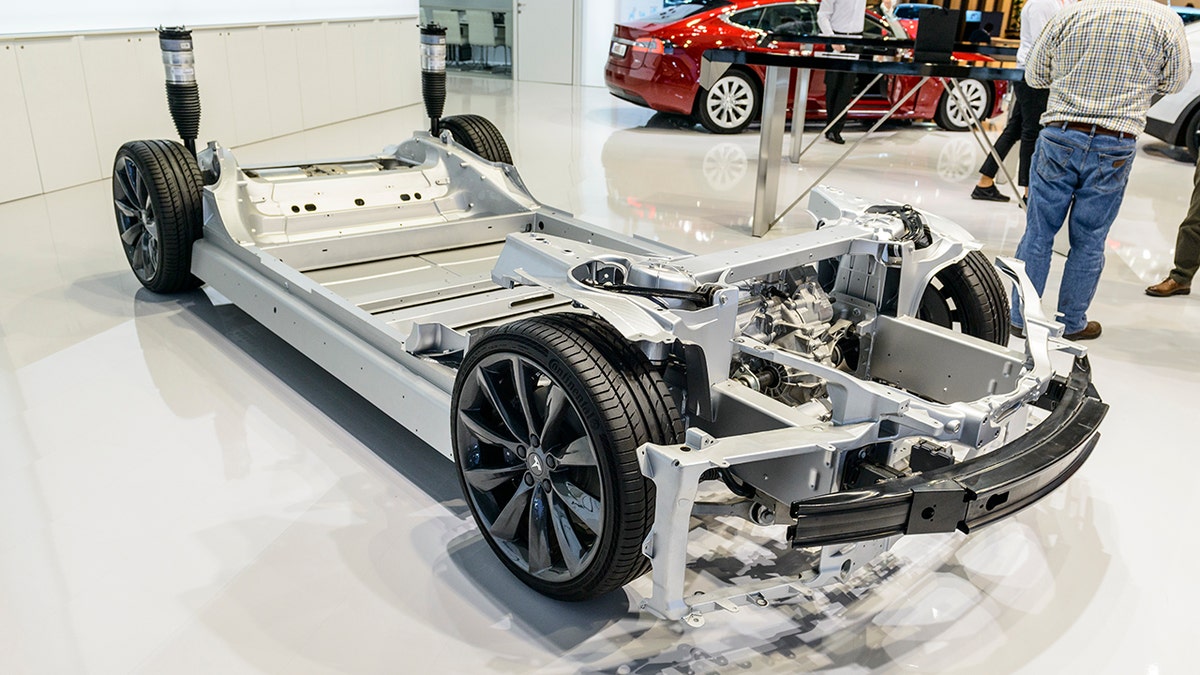 The Model S and X, pictured above, use a floor-mounted battery pack.
