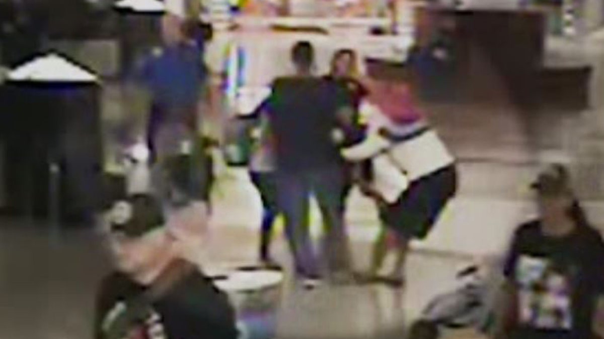 Esther Daniels, pictured, was able to pick up one of the family’s children and briefly run away.