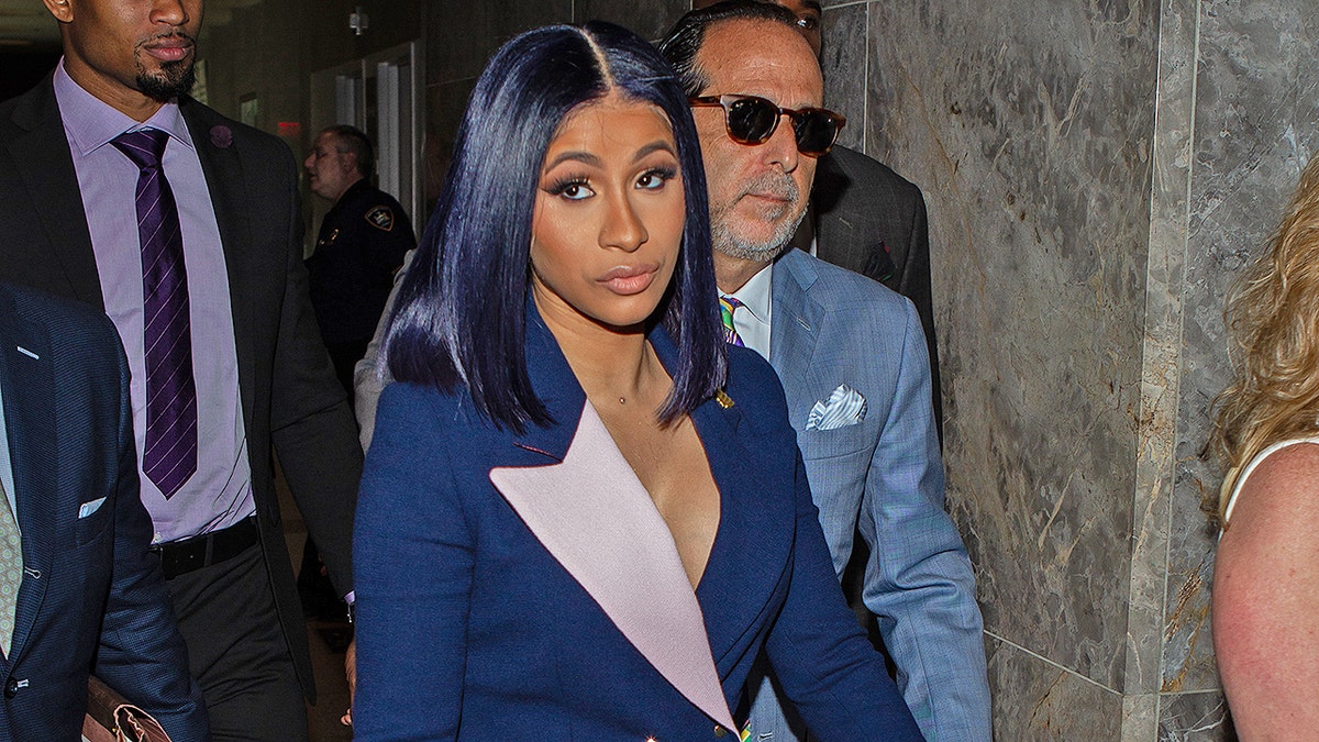 NEW YORK, NY - JUNE 25:  Cardi B leaves her arraignment on two felony assault counts and other misdemeanors at Queens County Supreme Court June 25, 2019 in the Queens borough of New York City. In all, the winner of 2019 Album of the Year at the BET Awards faces 12 charges related to an alleged August 2018 attack on bartenders at a Queens strip club, according to published reports.  (Photo by Anthony DelMundo-Pool/Getty Images)