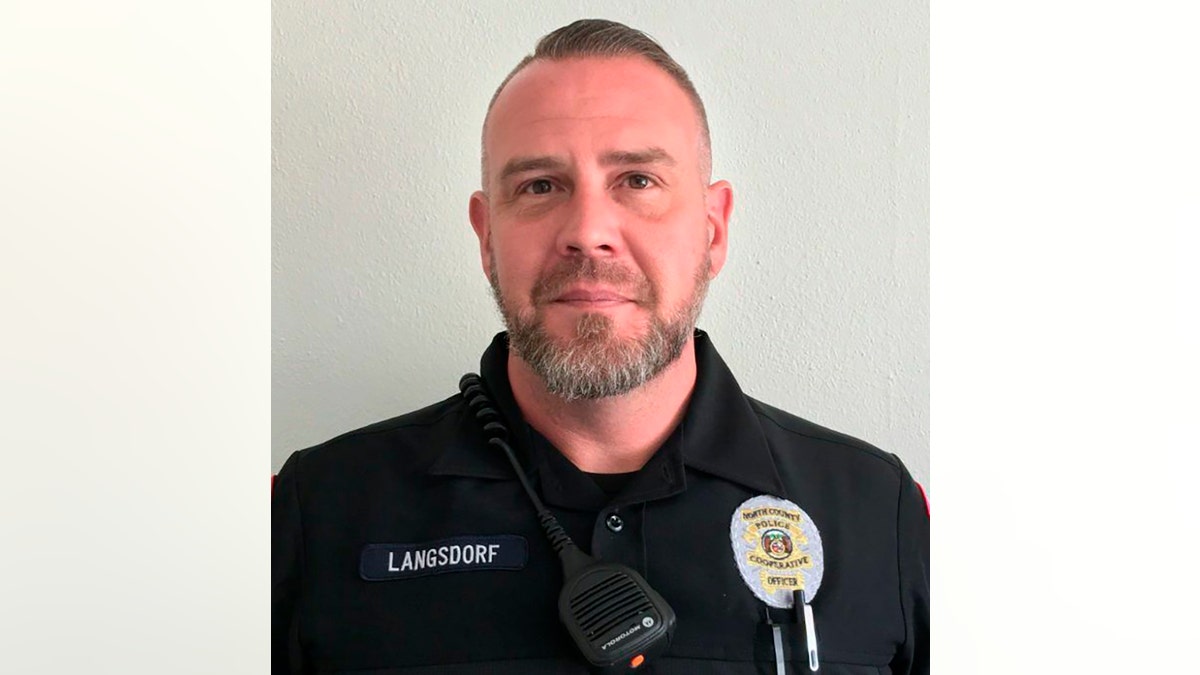 North County Police Cooperative Officer Michael Langsdorf. Officer Langsdorf was shot and killed Sunday, June 23, 2019 in Wellston, Mo., near St. Louis while responding to a bad check complaint at a food market. (North County Police Cooperative via AP)