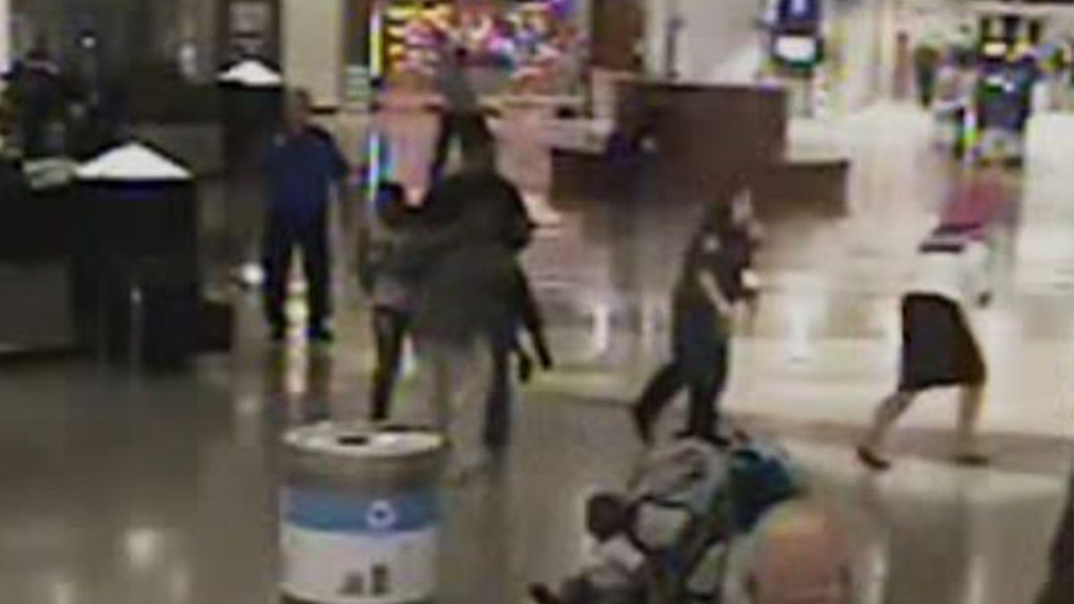 A female traffic control police officer quickly intervened, sprinting across Hartsfield-Jackson to help stop the abduction attempt.