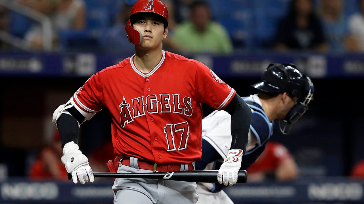 Los Angeles Angels' Shohei Ohtani, of Japan, reacts after drawing a bases-loaded walk from Tampa Bay Rays starting pitcher Blake Snell during the second inning of a baseball game Friday, June 14, 2019, in St. Petersburg, Fla. (Associated Press)