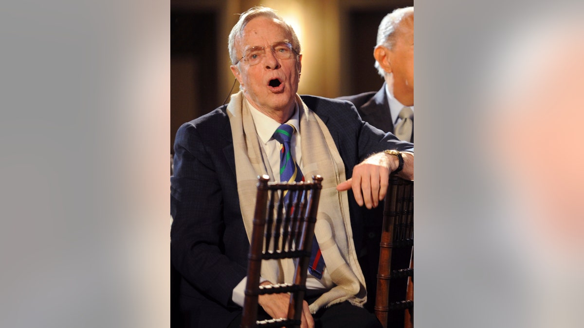 In this Monday, March 31, 2008 file photo, talian director and designer Franco Zeffirelli, left, reacts as various actors and singers are introduced at 