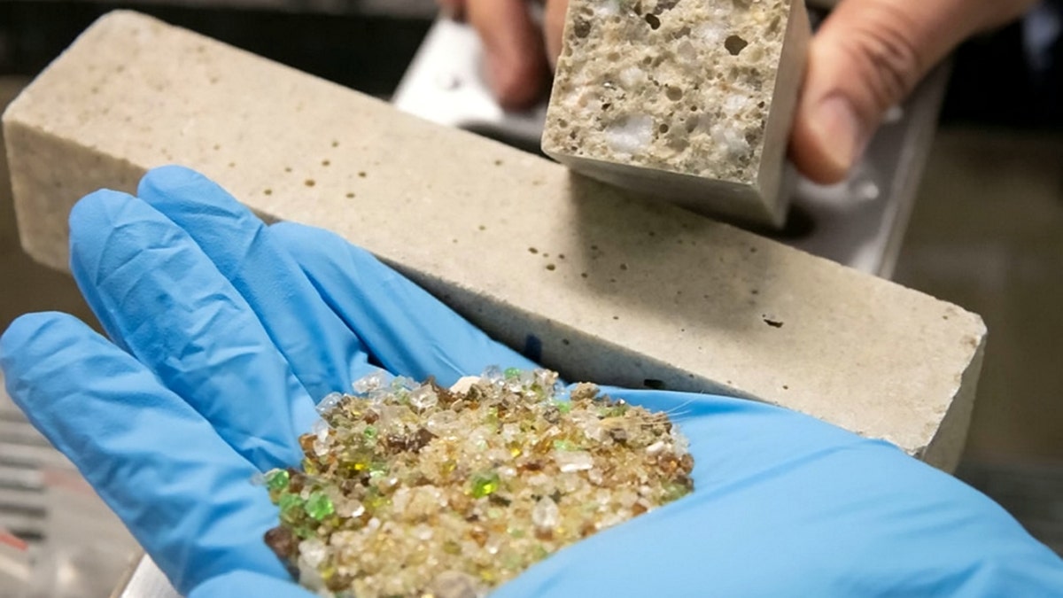 Australian researchers have discovered that old ground glass can be used to make polymer concrete, which can be used for roads and carparks. (Credit: SWNS)