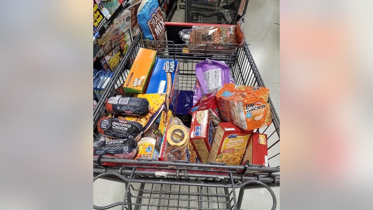 Officer James Riley purchased groceries for a local family after he said they appeared to be “going through difficult financial times.”