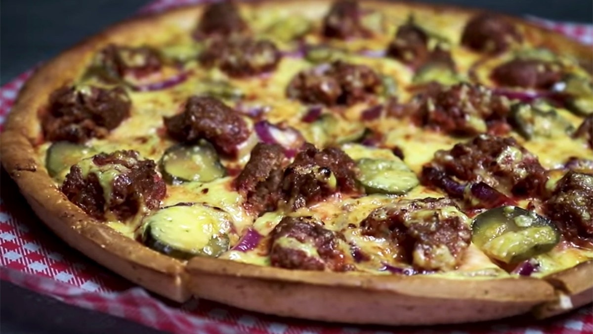 The hamburger pizza prompted backlash when the chain failed to reveal it was actually usually fake meat brand Beyond Meat for the patty.
