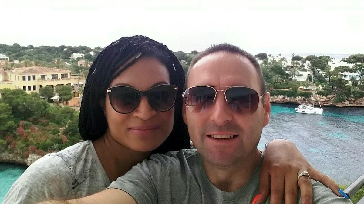 Caroline Johnson, pictured with her husband Philip on their family vacation in Majorca, said she is lucky to be alive.