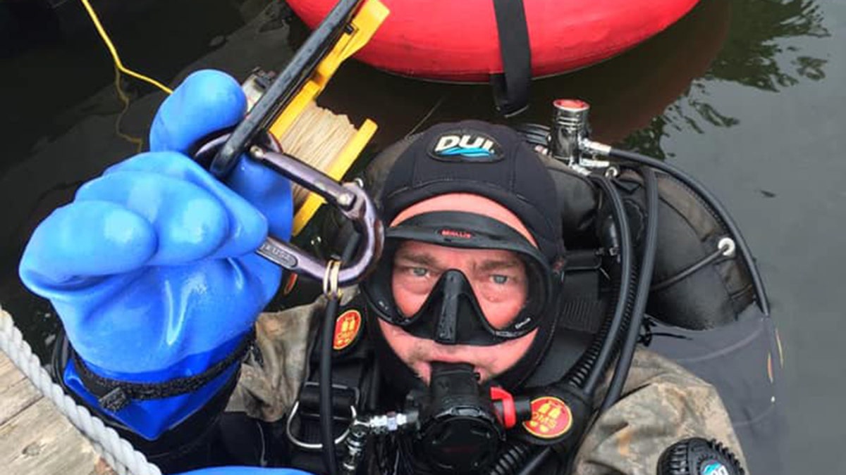 Dive Lt. Rich Slidgerski found a woman's missing wedding ring in 18 feet of water in Lake Wallenpaupack in Pennsylvania.