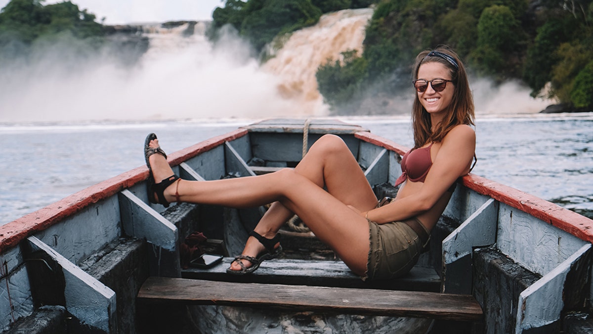 One 21-year-old American woman, pictured, has achieved an unbelievable feat that many only dream of – visiting every country on earth.