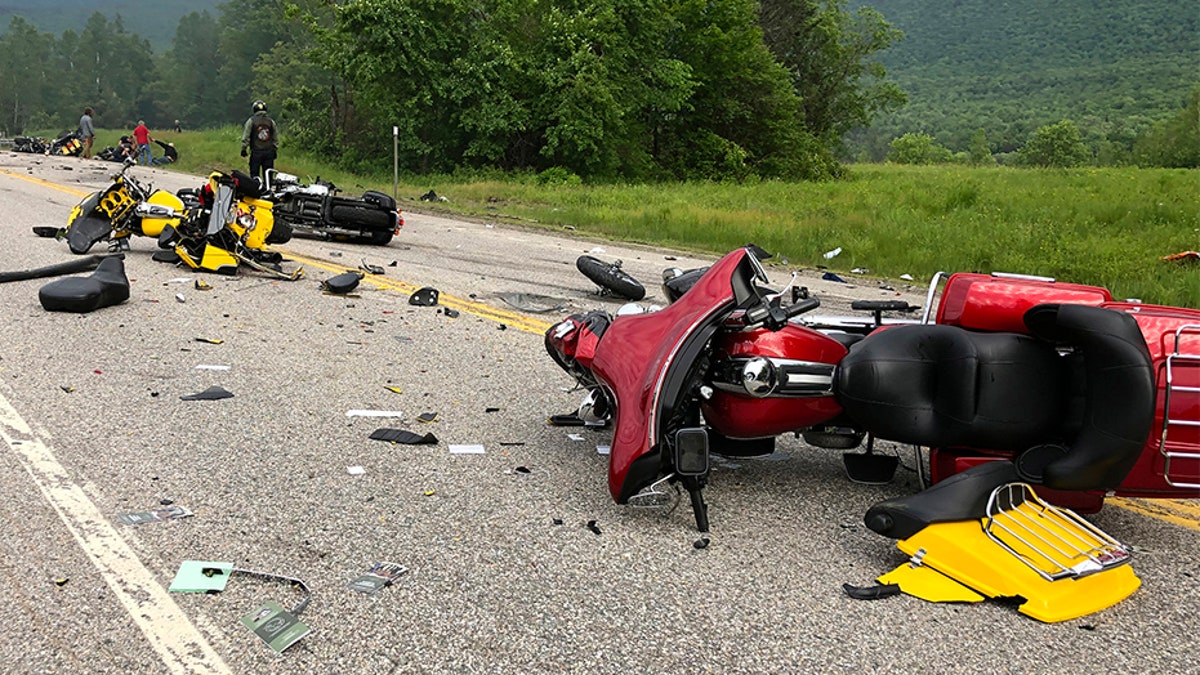 This photo provided by Miranda Thompson shows the scene where several motorcycles and a pickup truck collided on a rural, two-lane highway Friday, in Randolph, N.H. (AP/Miranda Thompson)