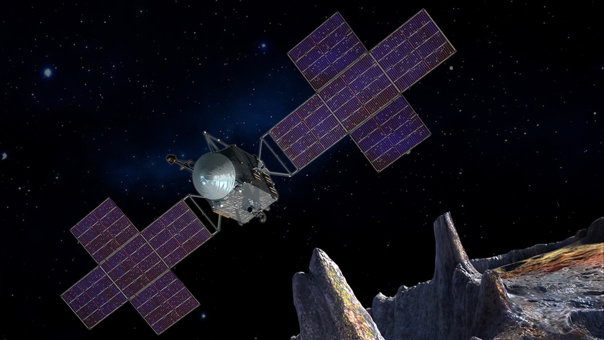 This artist's-concept illustration depicts the spacecraft of NASA's Psyche mission near the mission's target, the metal asteroid Psyche. The artwork was created in May 2017 to show the five-panel solar arrays planned for the spacecraft. (Credit: NASA/JPL-Caltech/Arizona State Univ./Space Systems Loral/Peter Rubin)
