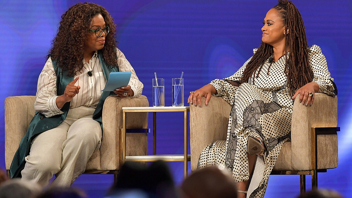 LOS ANGELES, CALIFORNIA - JUNE 09: Oprah Winfrey and Ava DuVernay speak onstage at the Netflix 