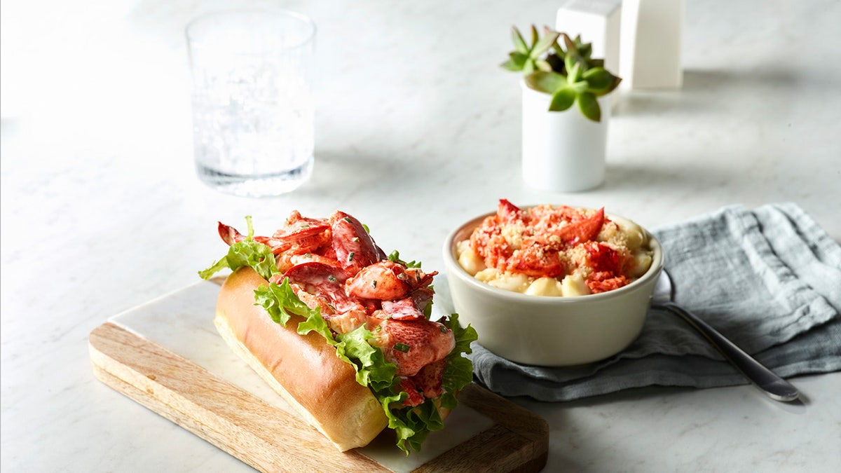 A lobster roll sandwich and lobster mac and cheese have arrived on select Panera Bread menus through the end of the summer.