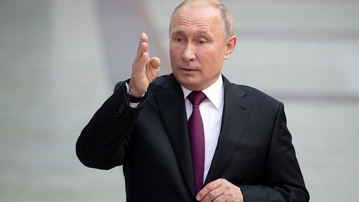 Russian President Vladimir Putin gestures answers a journalist's question after his annual call-in show in Moscow, Russia, on Thursday. (AP)