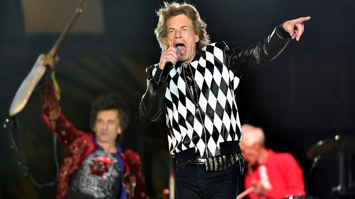 Ron Wood, left, and Mick Jagger, of the Rolling Stones perform during the 