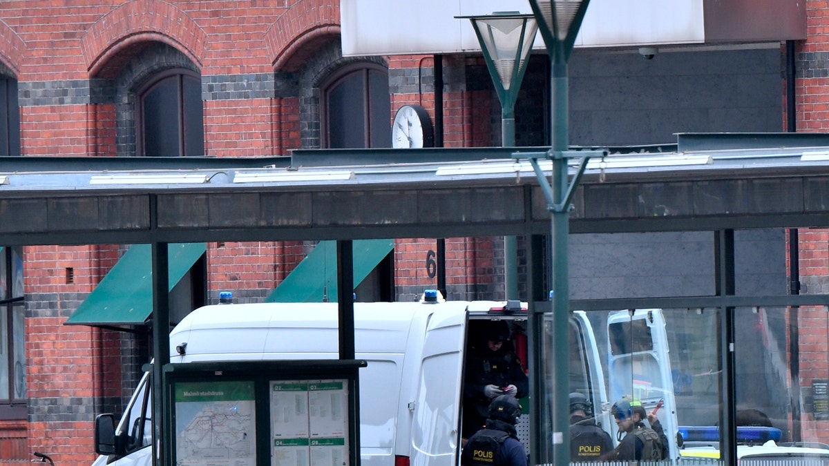 Swedish police say officers have shot and wounded a man who was threatening people at a train station.