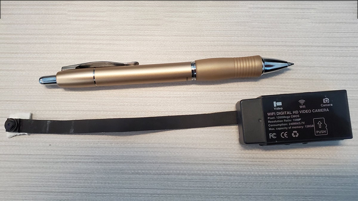 The small camera, which is a little larger than a standard ball-point pen, was discovered on the underside on the toilet lid.