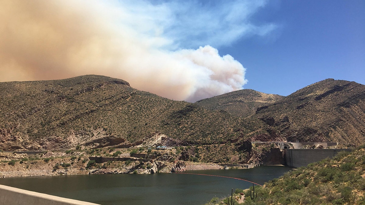 The Woodbury Fire began on June 8 in the Tonto National Forest near Roosevelt Lake and has since forced the evacuation of about 700 homes as the human-caused wildfire has grown over 100 square miles.