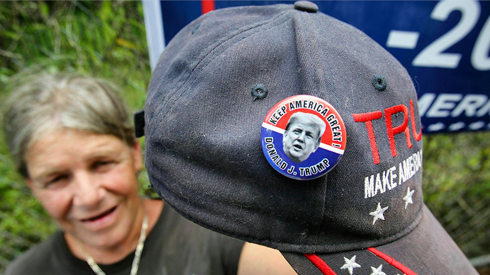 Anna Connelly, from Inverness, Fla., showing off one of her favorite campaign pins.