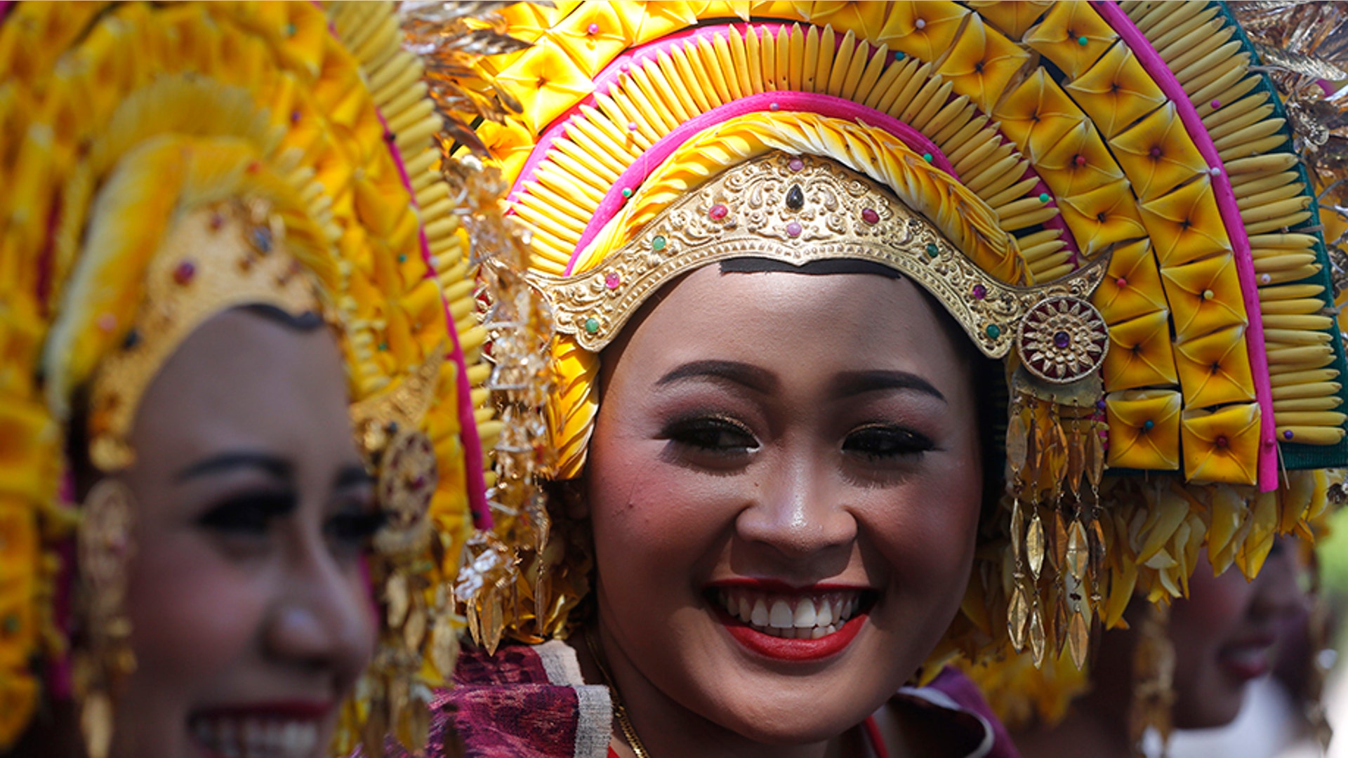 Women in traditional costume wait to perform during the Arts Festival in Bali, Indonesia, June 15, 2019. 