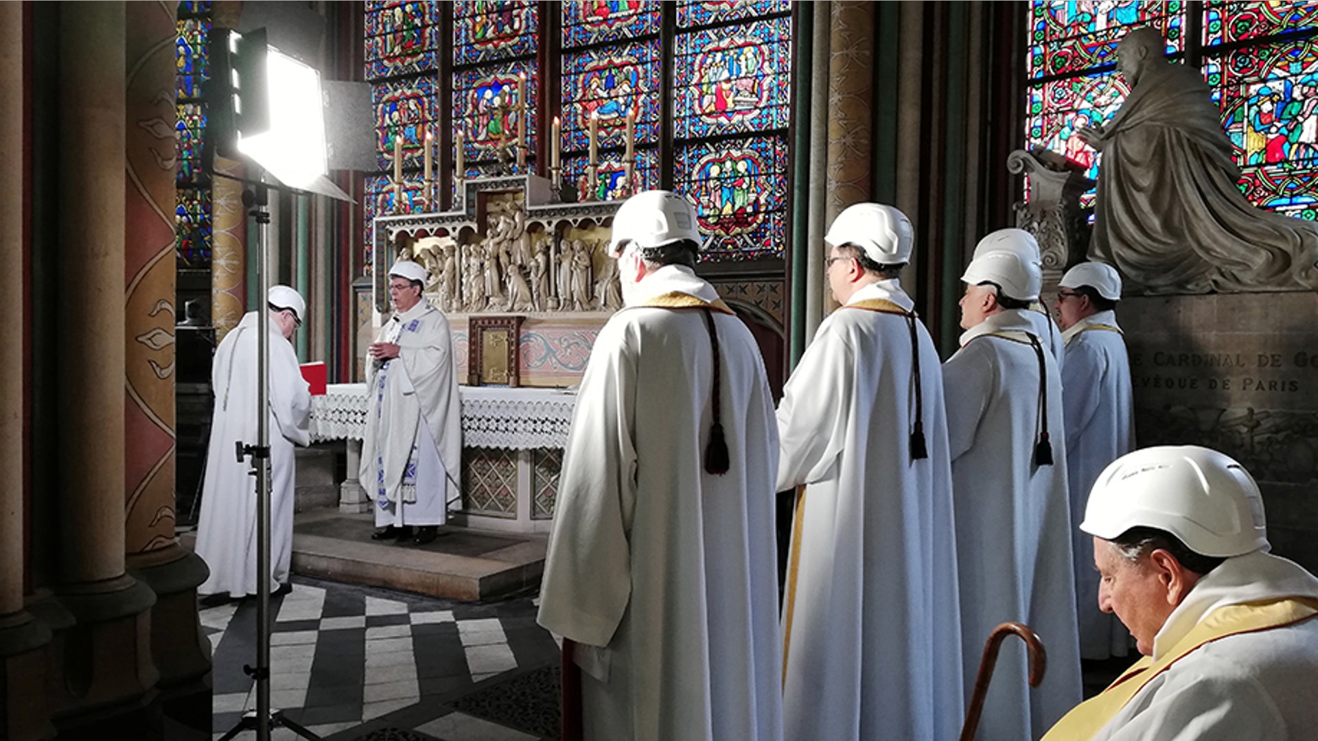 The Archbishop of Paris Michel Aupetit leads the first mass in a side chapel two months to the day after a devastating fire engulfed the Notre-Dame de Paris cathedral, in Paris, June 15, 2019. 