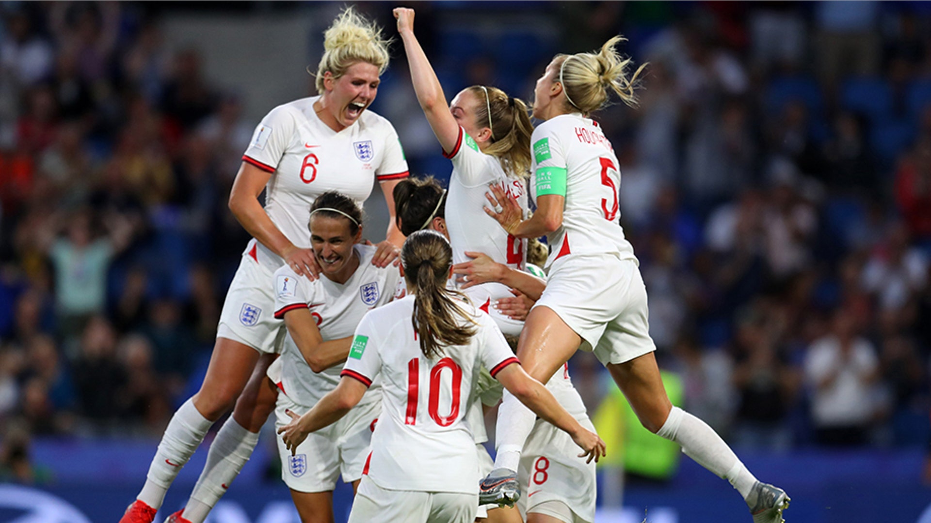England players celebrate after Lucy Bronze of England scored her team's third goal during their 2019 FIFA Women's World Cup quarter-final match against Norway in Le Havre, France June 27, 2019. 