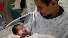 Baby cut from Chicago mom's womb improving in hospital, breathed without machine, family says