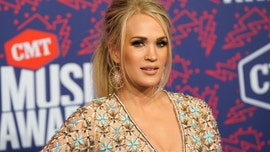 Carrie Underwood wants her kids to have a 'normal childhood' despite famous parents