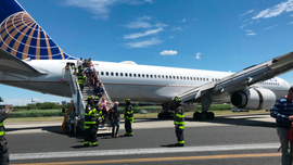 Plane landing at Newark airport blows tires, skids on runway