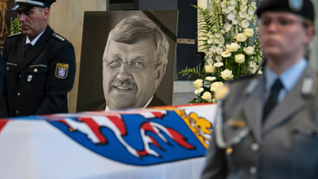 German prosecutors say man from 'far-right background' may have killed pro-refugee Merkel ally