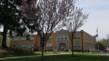 Indiana HS cuts ties with gay teacher to stay in archdiocese: report