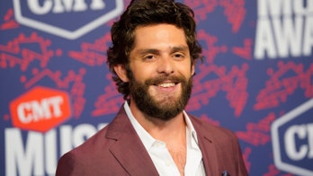Thomas Rhett explains why he hit back at social media trolls mocking his wife Lauren