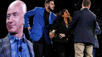 Jeff Bezos confronted by animal-rights protester during Las Vegas conference