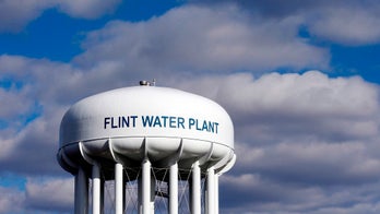 Prosecutors drop charges against 8 in Flint probe, vow new investigation